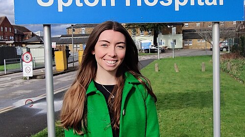 Chelsea Whyte, Lib Dem Parliamentary Candidate, outside Upton Hospital